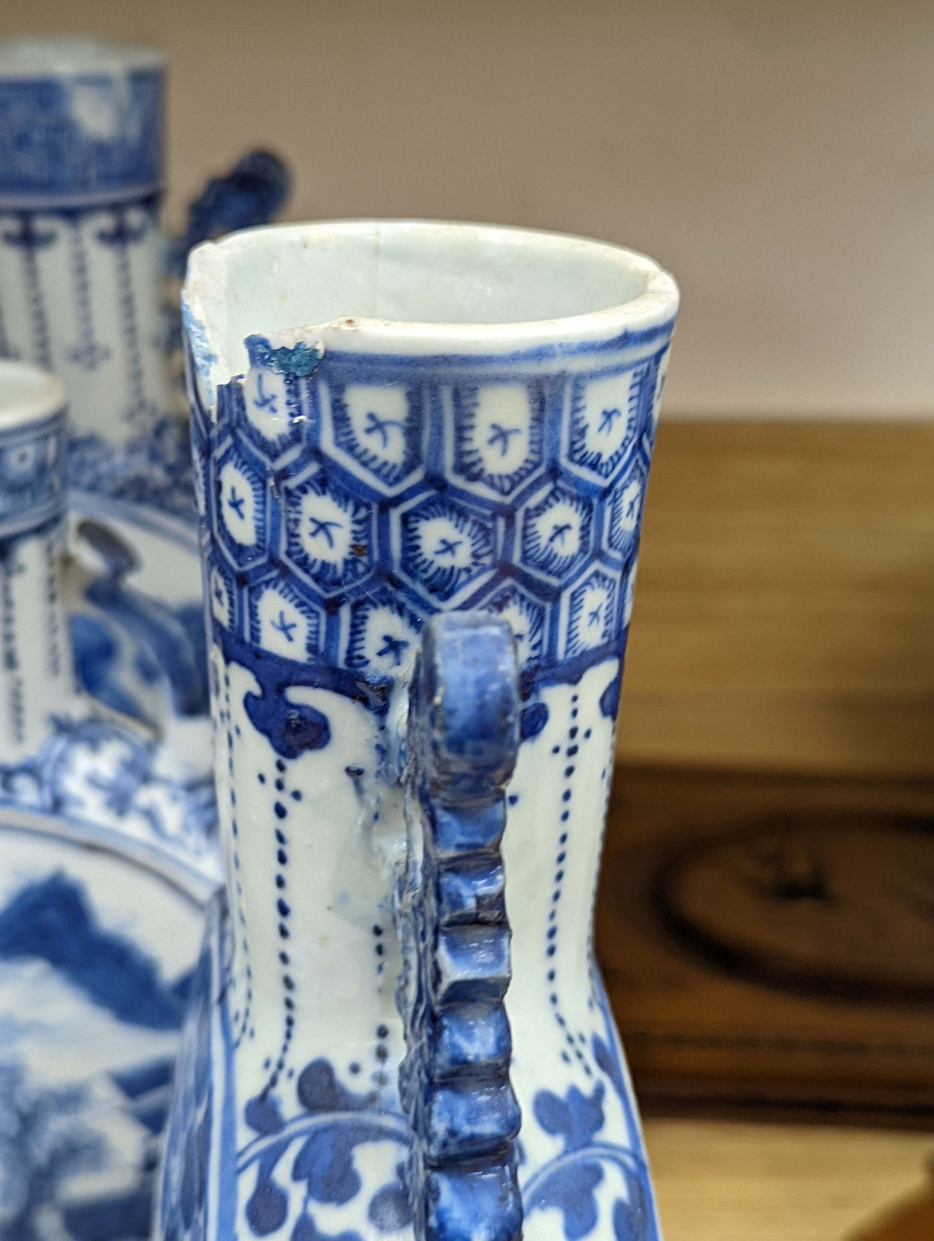 Three 19th century Chinese blue and white Moon flasks, tallest 31 cms.